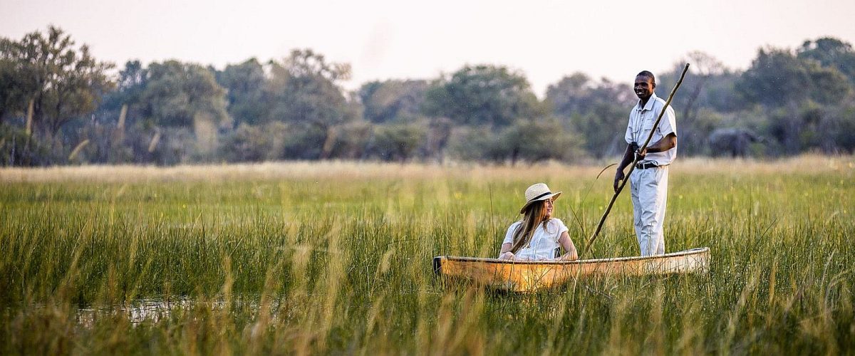 Botswana vs Zambia vs Zimbabwe comparison - Mokoro safari in Okavango delta in Chiefs Camp on a Botswana safari