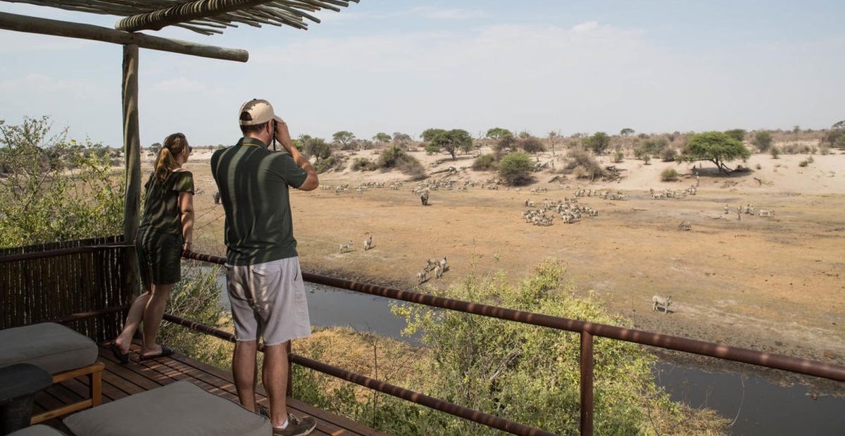 Leroo La Tau room deck view Pano, remote safari lodges of Botswana