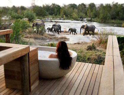 londolozi Trish in an outdoor bath, safari & beach honeymoons in Africa