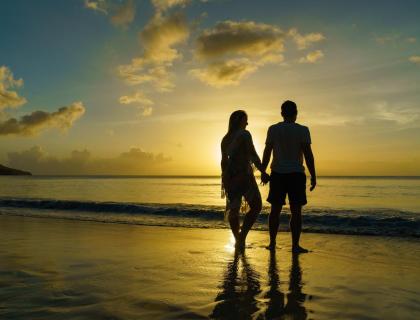 Couple on a Mahe beach holiday