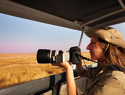 Person on a Masai Mara safari with a camera