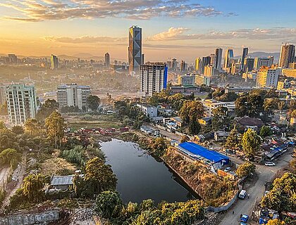 Aerial overview of Addis Abeba city, the capital of Ethiopia, showing brand new buildings and construction in the foreground, city centre and suburbs, Ethiopia